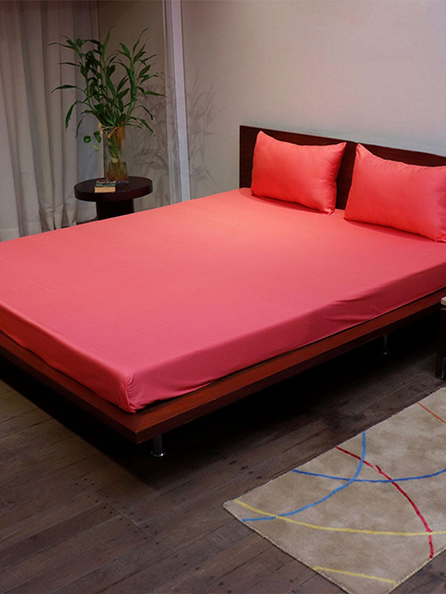 coral Pink colored plain soft bedsheet with 2 matching pillow covers made from 100% pure cotton for king size double bed in 300 thread count fabric
