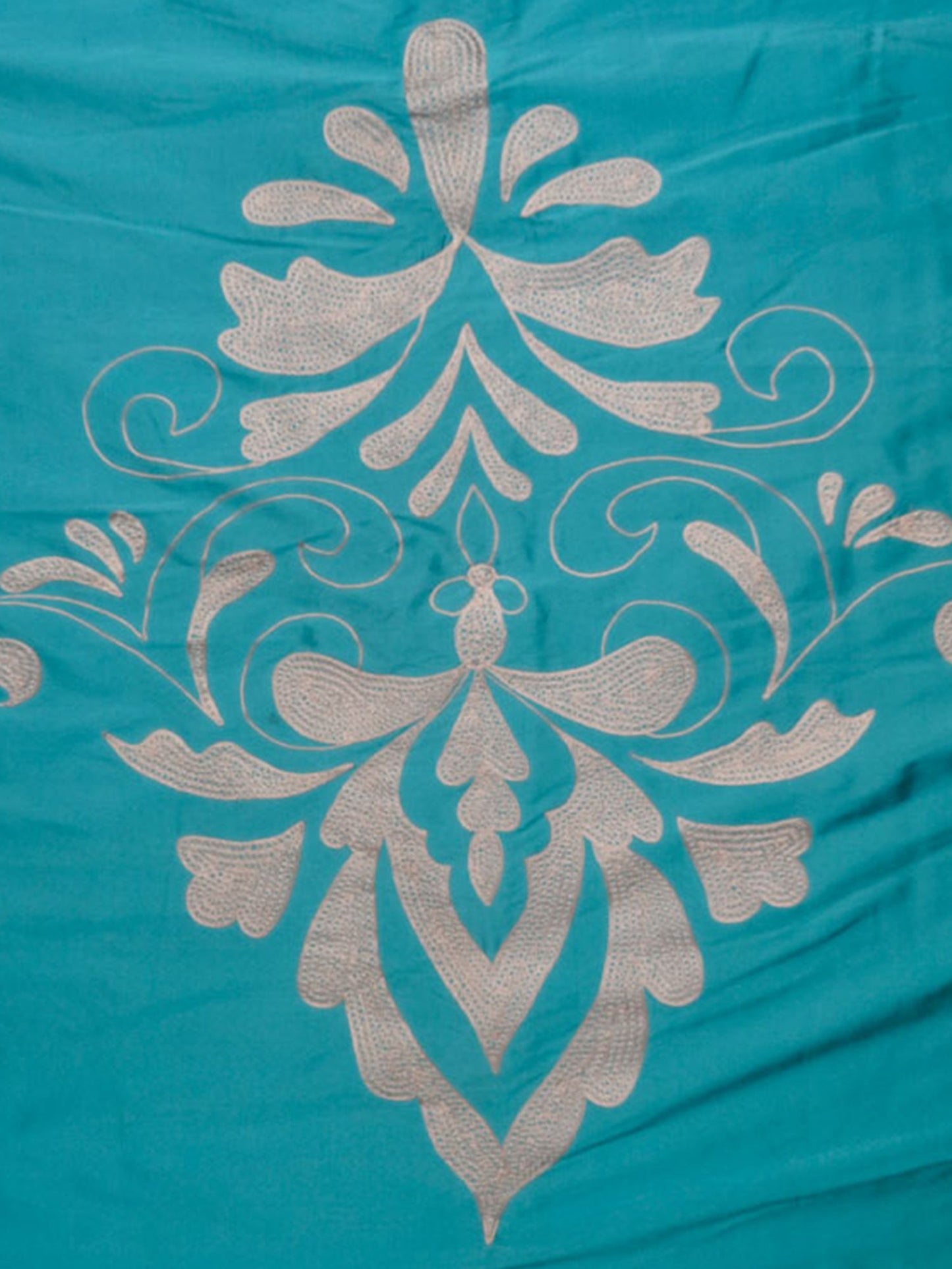 Turquoise blue colored embroidered bed quilt with 2 matching pillow covers made from polyester front adn cotton backed quilt for king size double bed 