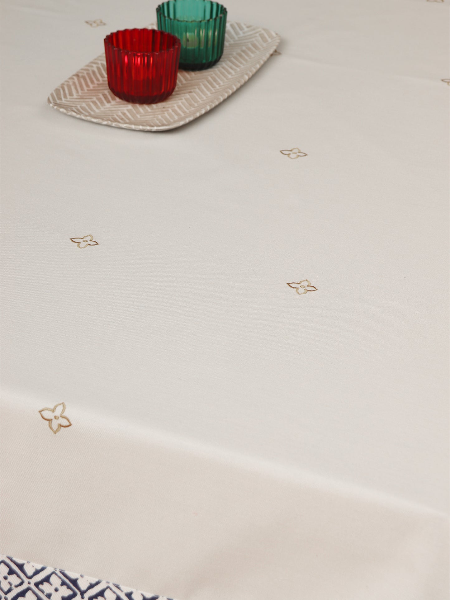 gold colored embroidered table cover with printed panel border for 6 seater table 52x84 inches