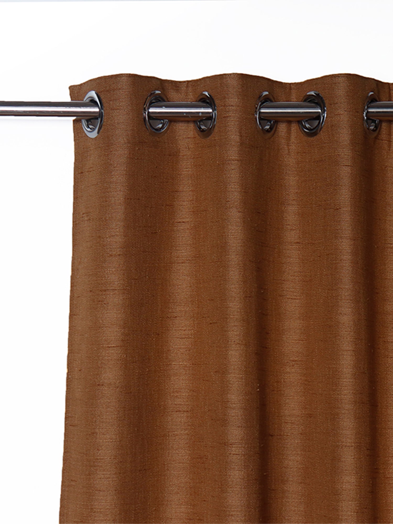 closeup of hanging curtain with eyelet and rod in ochre brown color - 54x84 inch