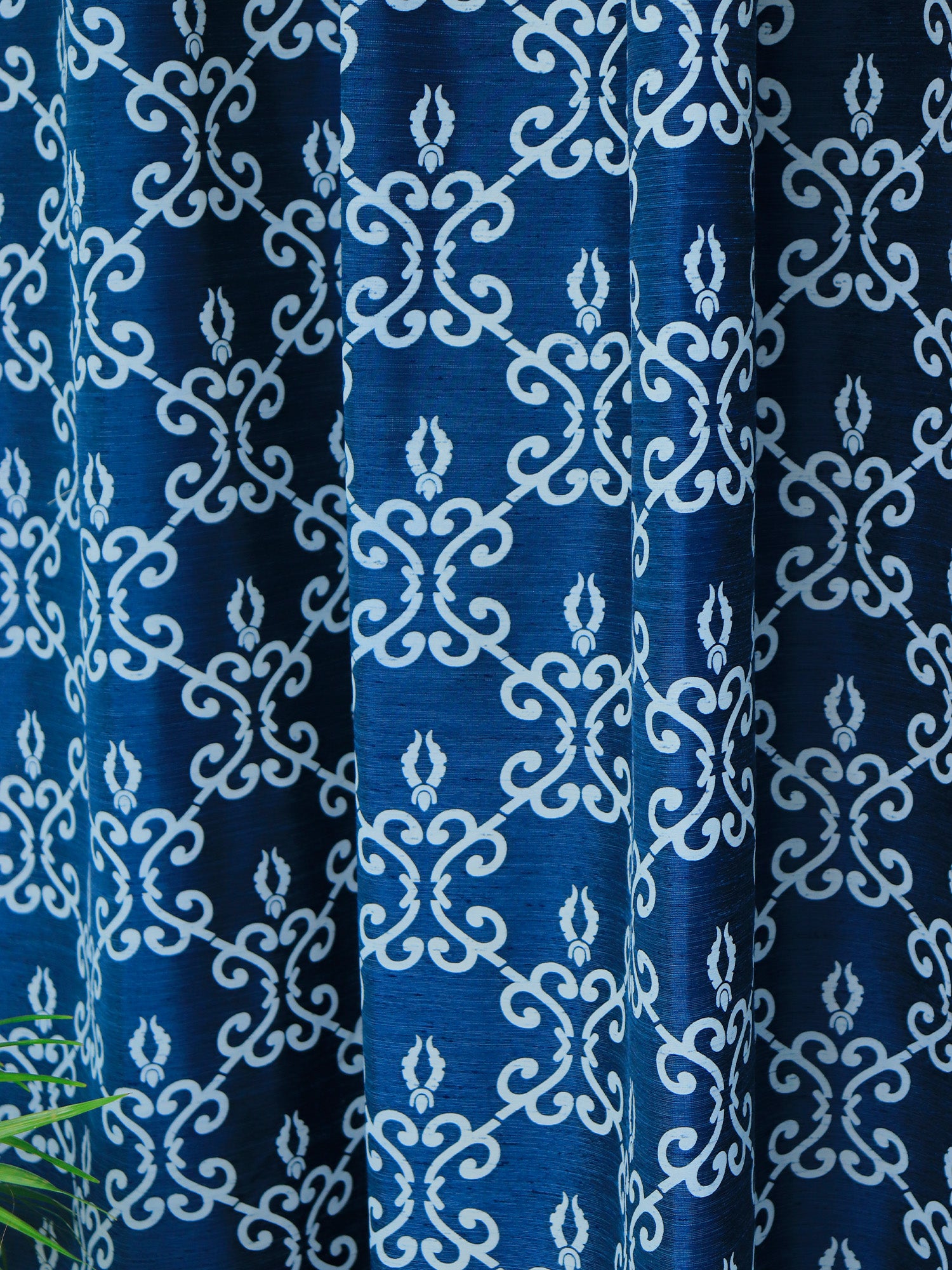 closeup of abstract printed door curtains on dark blue color with rod pocket - 7.5 feet, 52x90 inch 