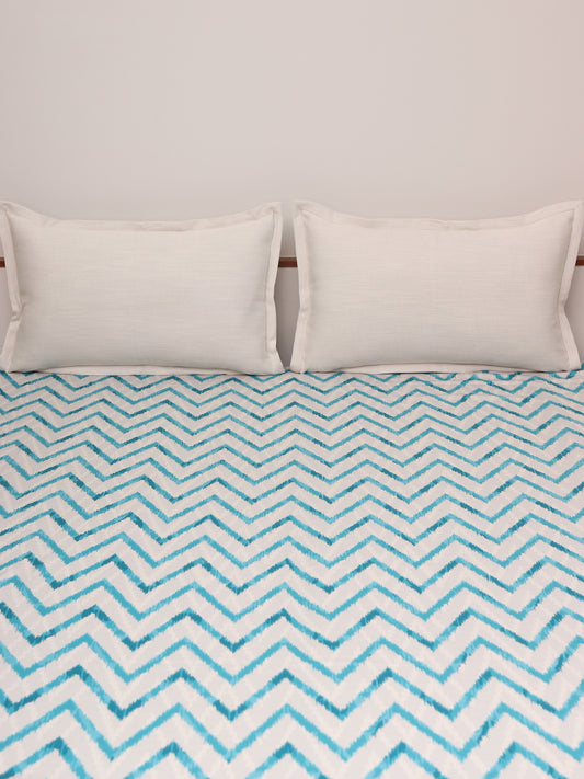 blue colored chevron printed bed cover with 2 matching pillow covers made from cotton blend for queen size double bed 90x108 inch