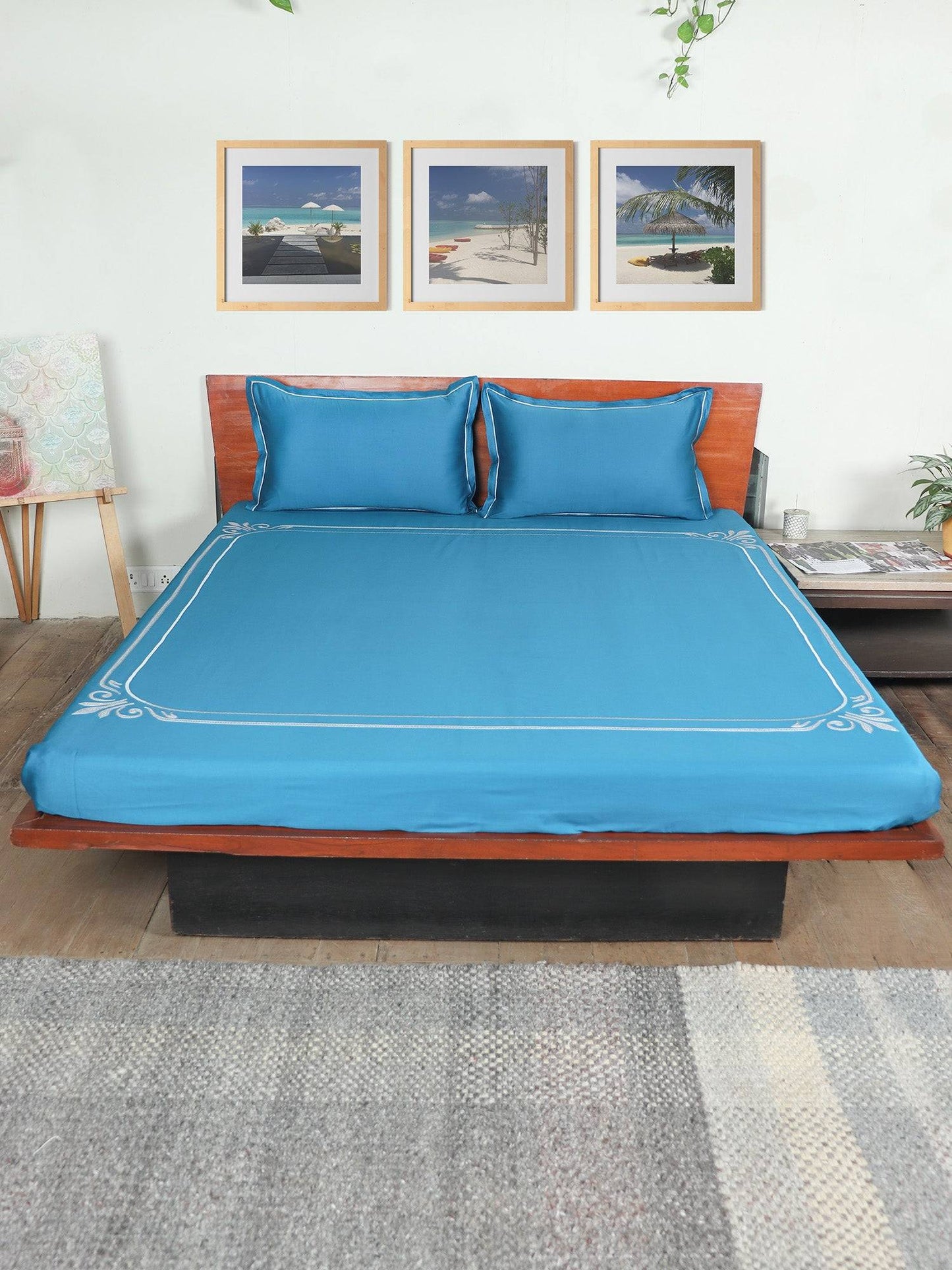 teal blue colored embroidered soft bedsheet with 2 matching pillow covers made from 100% pure cotton for king size double bed in 400 thread count fabric