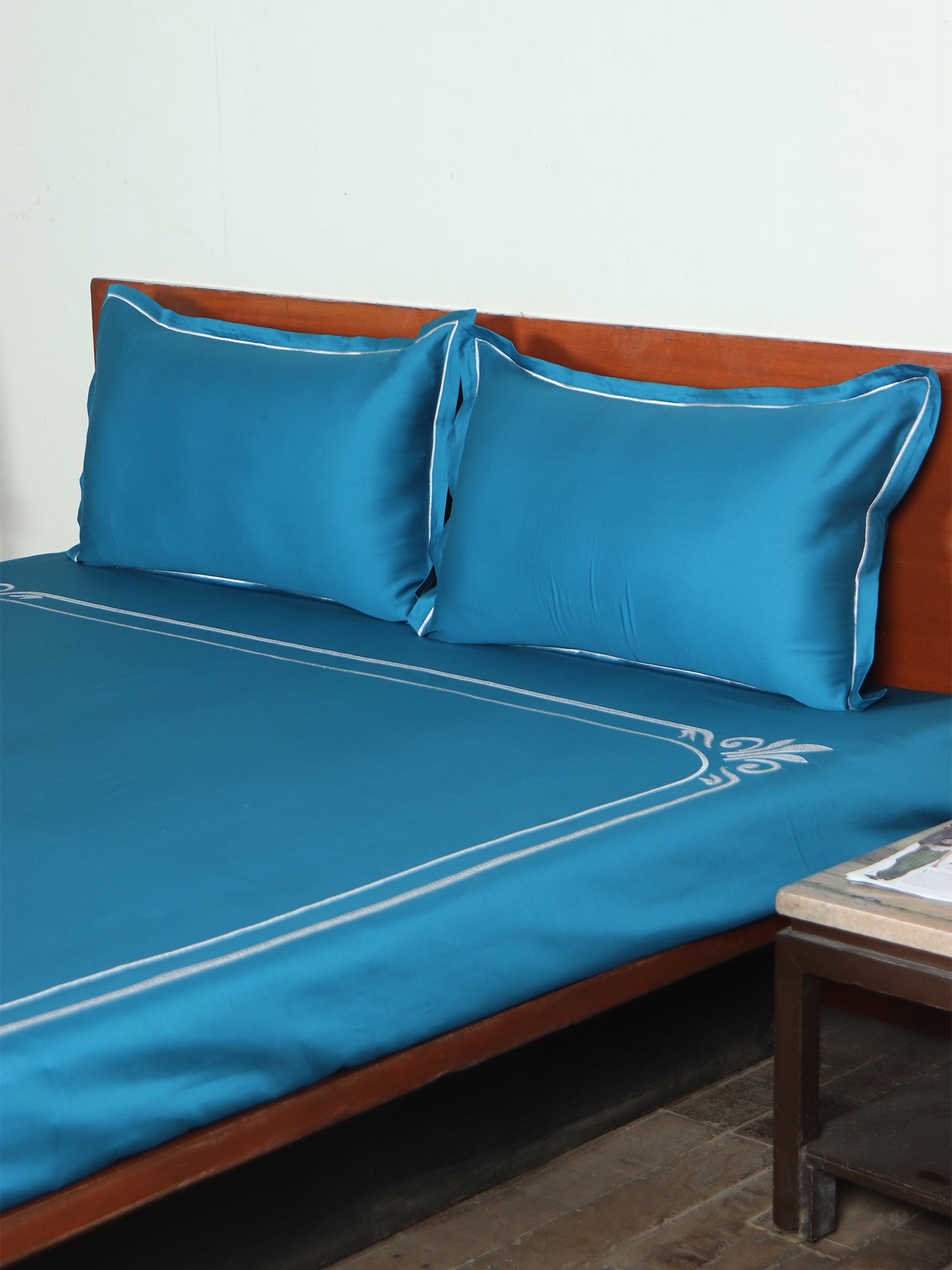 teal blue colored embroidered soft bedsheet with 2 matching pillow covers made from 100% pure cotton for king size double bed in 400 thread count fabric