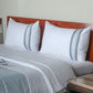 Grey blue colored embroidered bed quilt /comforter with 2 matching pillow covers made from polyester front and cotton backed quilt for king size double bed 