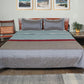 Grey colored bed quilt with 2 matching pillow covers made from polyester front and cotton backed quilt for king size double bed 