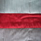 red patch on Grey colored bed quilt with 2 matching pillow covers made from polyester front and cotton backed quilt for king size double bed 
