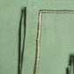 closeup of embroidered set of 6 dinner napkins in olive green color - 16x16 inch