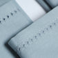 close up of fagotting embroidered set of 6 dinner napkins in blue color - 16x16 inch