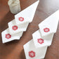 motif embroidered in red color on white colored set of 6 dinner napkins - 16x16 inch