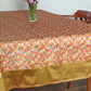 red and gold colored benarasi brocade silk table cover with panel border for 6 seater table 52x84 inches