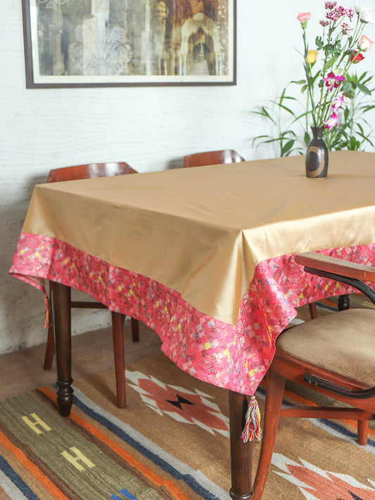 pink colored benarasi brocade silk and golden table cover with panel border and multi colored tassels for 6 seater table 52x84 inches