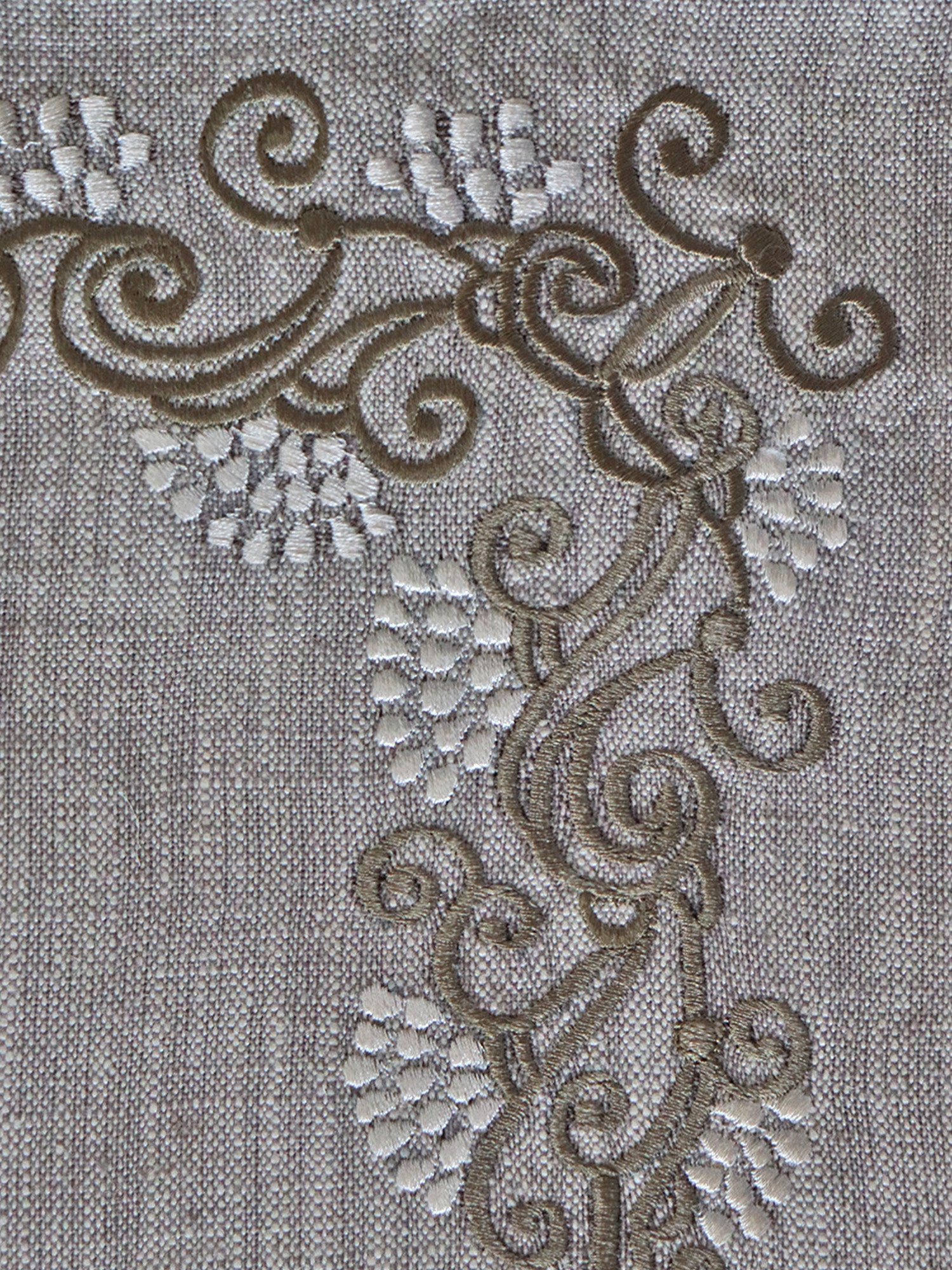 closeup of embroidered grey dinner table mats in grey tones - 13x19 inch