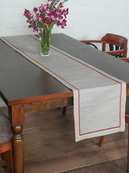 grey colored embroidered table runner for 6 seater table - 52x84 inches