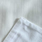 closeup of red embroidered classic white table runner for 6 seater dining table - 12x84 inches