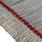 close up of embroidery on gray colored table runner for 6 seater table