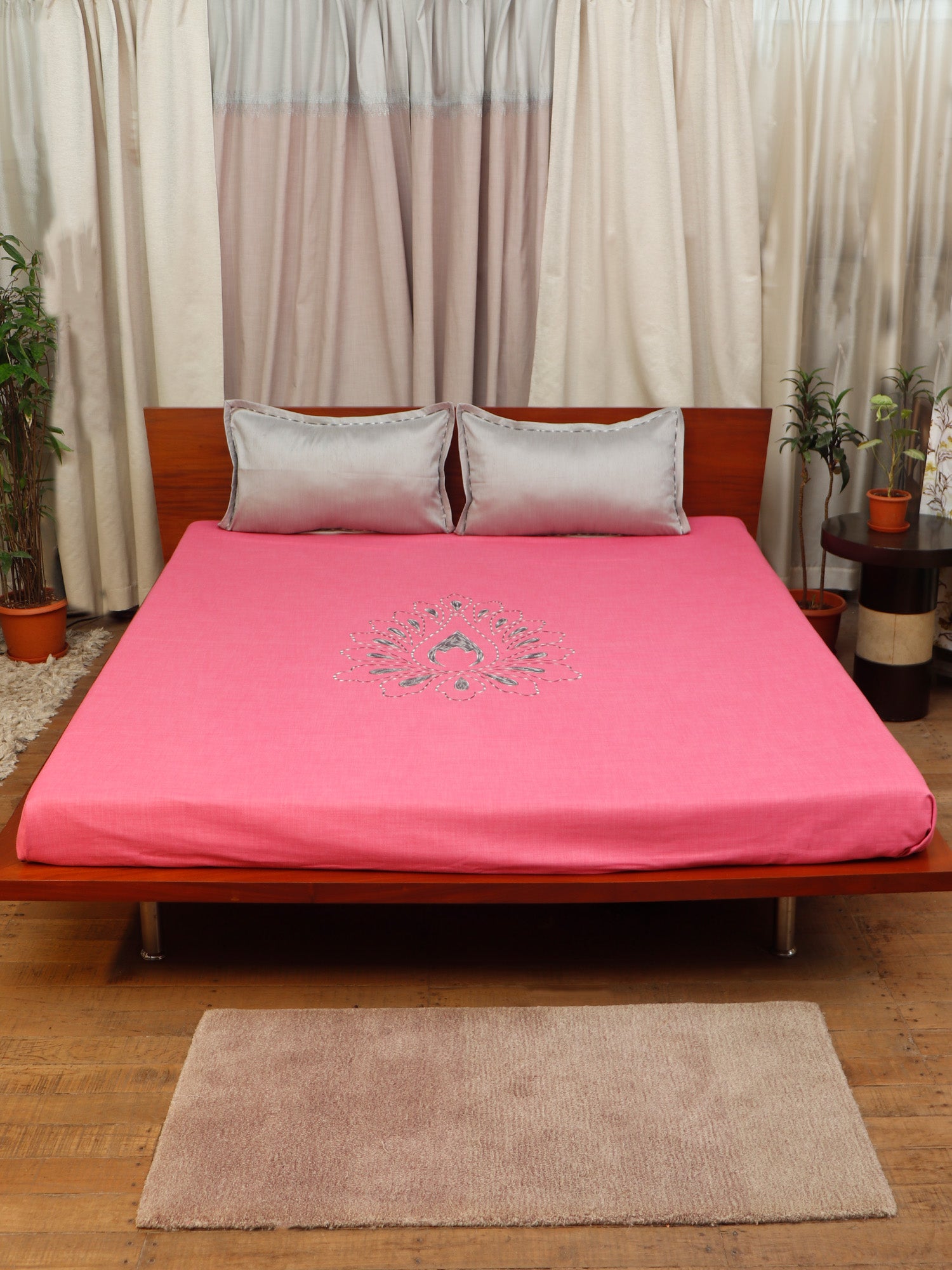 Pink colored embroidered bed cover with 2 matching pillow covers made from cotton blend for queen size double bed 90x108 inch