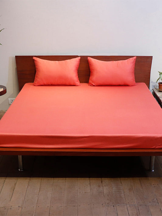 coral pink colored plain soft bedsheet with 2 matching pillow covers made from 100% pure cotton for king size double bed in 108x108inches