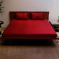 Maroon coloured plain bedsheet with 2 matching pillow covers made from 100% pure cotton for king size double bed