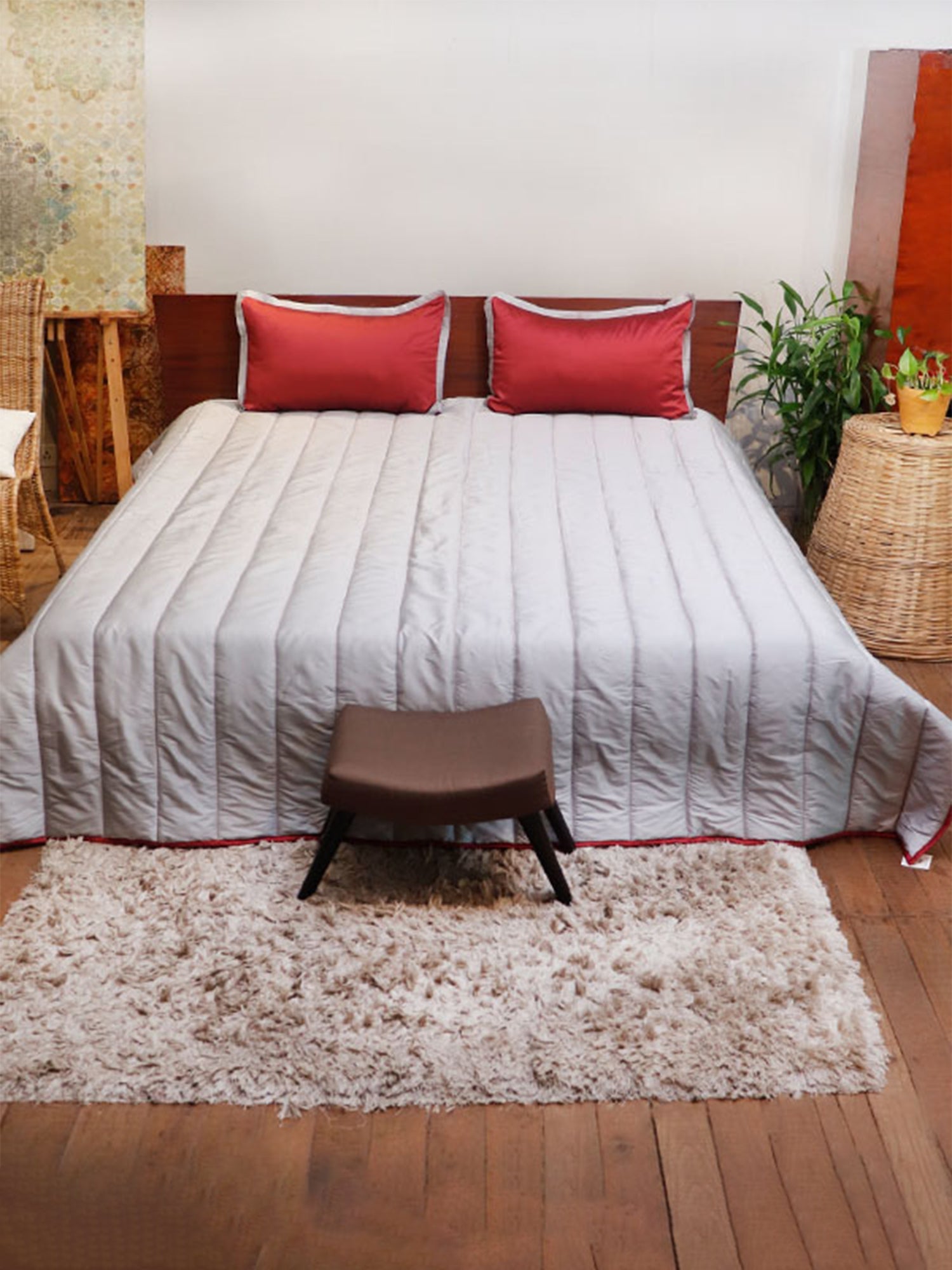 Grey colored embroidered bed quilt with 2 marron pillow covers made from polyester front and cotton backed quilt for king size double bed 