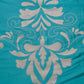 Turquoise blue colored embroidered bed quilt with 2 matching pillow covers made from polyester front adn cotton backed quilt for king size double bed 