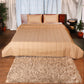 Golden colored embroidered bed quilt /comforter with 2 matching pillow covers made from polyester front and cotton backed quilt for king size double bed 