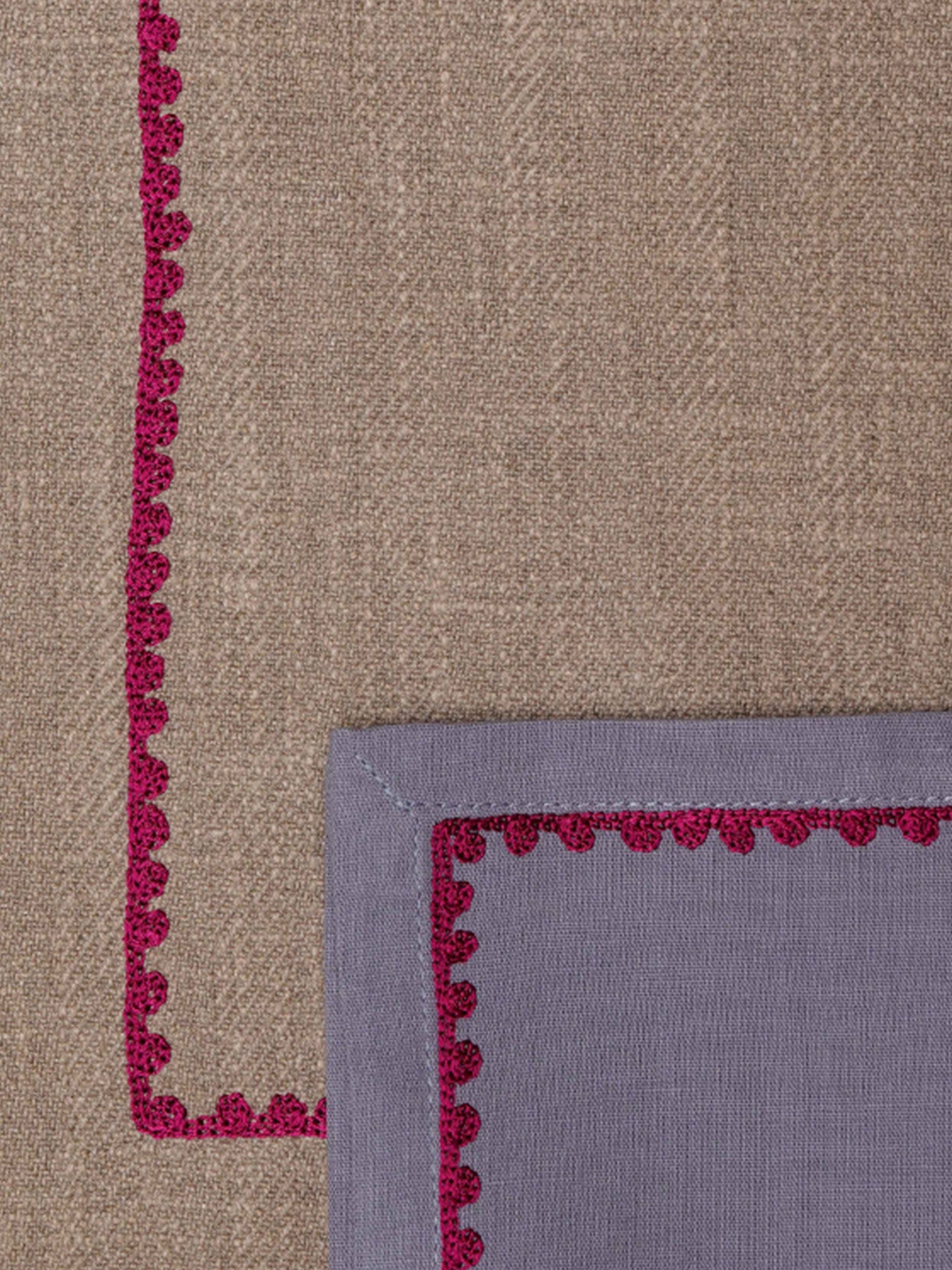 closeup of red embroidery on dinner table placemats and napkins in gray shades - 13x19 inch 