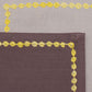 closeup of yellow embroidered grey colored placemats with grey colored cotton napkins - 13x19 inch