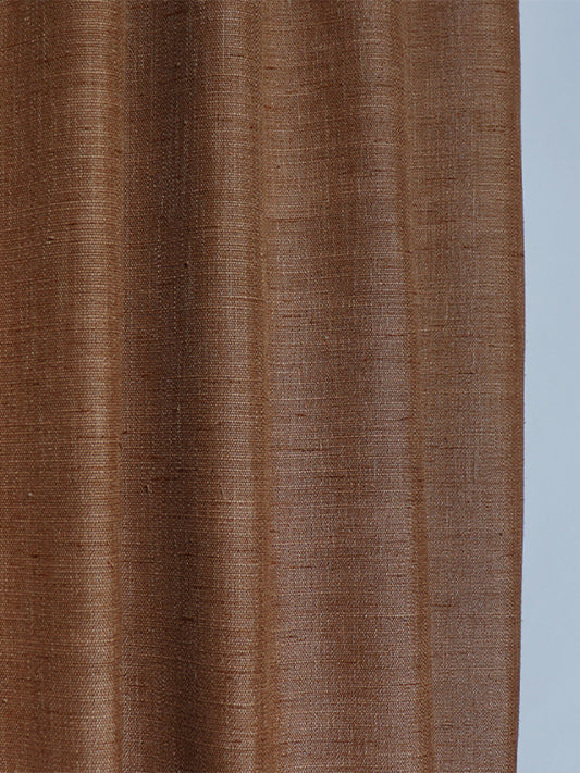 closeup of set of 2 curtains in self textured ochre brown color with eyelet - 7feet, 54x84 feet