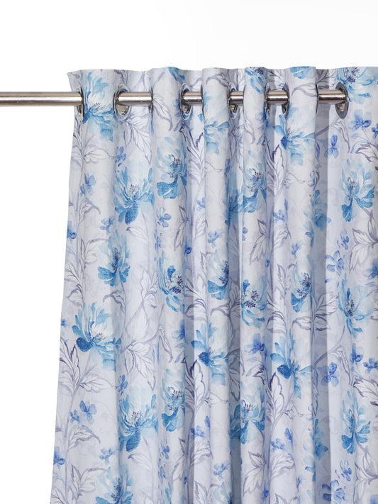 closeup of floral printed window curtain in blue color with eyelet - 50x60 inch