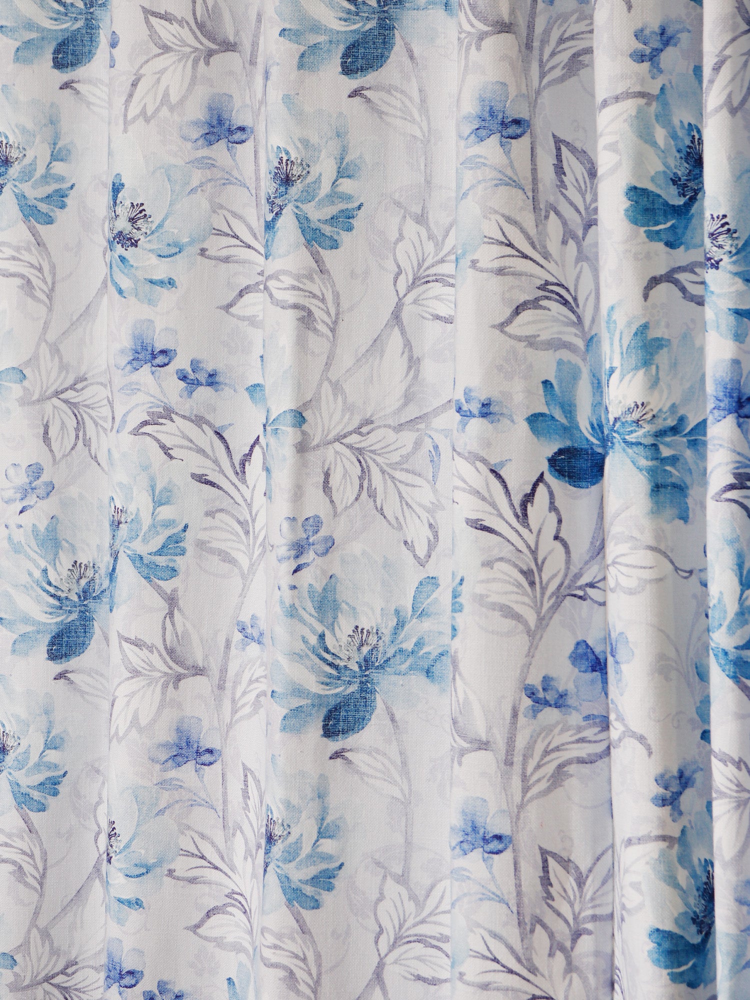 closeup of floral printed window curtain in blue color - 50x60 inch