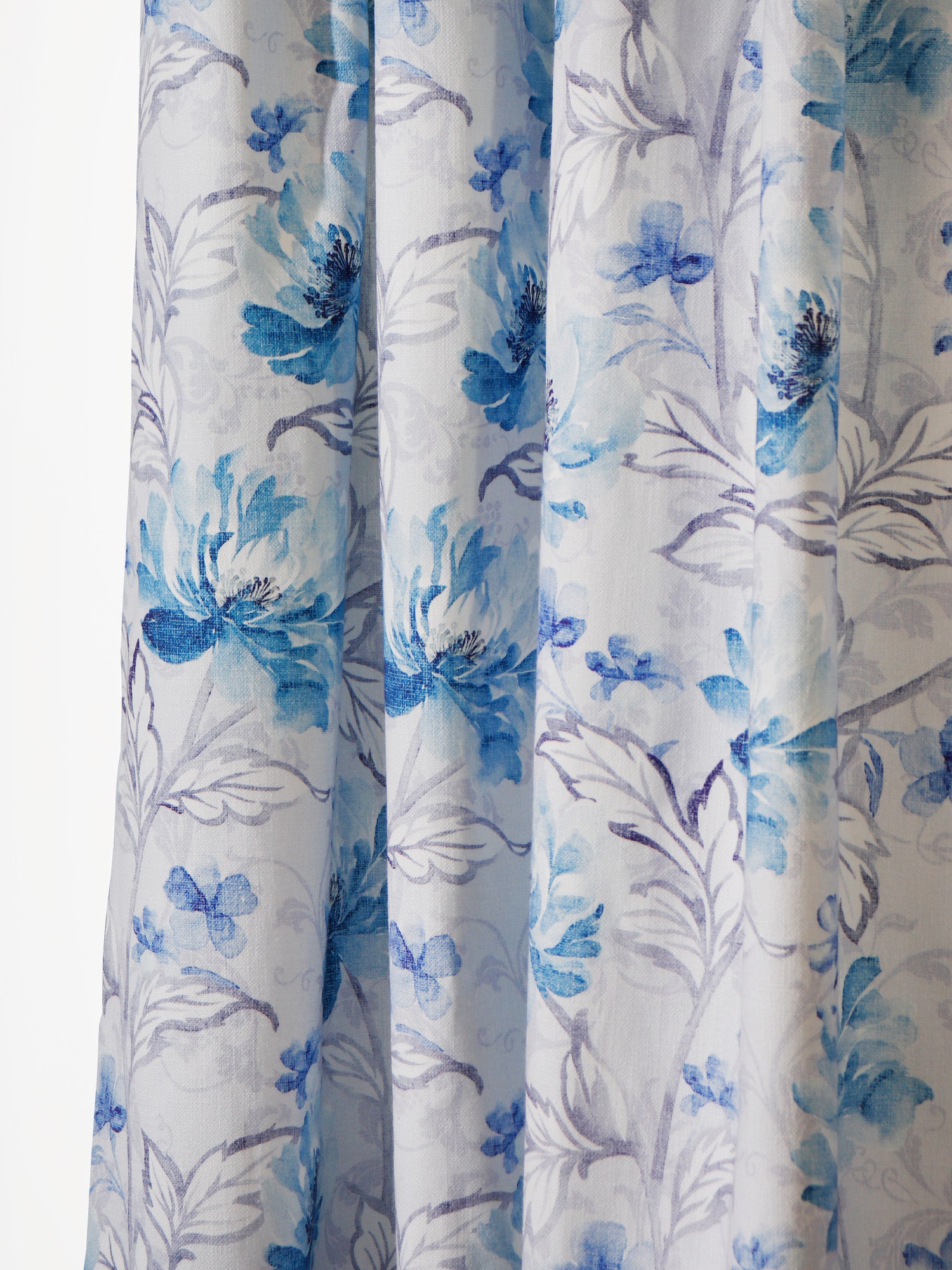 closeup of floral printed window curtain in blue color - 50x60 inch